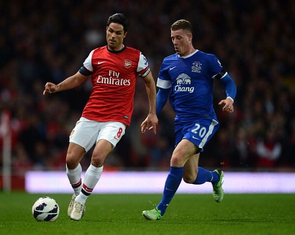 LONDON, ENGLAND - APRIL 16: Mikel Arteta of Arsenal and Ross Barkley of Everton compete for the ball during the Barclays Premier League match between Arsenal and Everton at Emirates Stadium on April 16, 2013 in London, England. (Photo by Michael Regan/Getty Images)